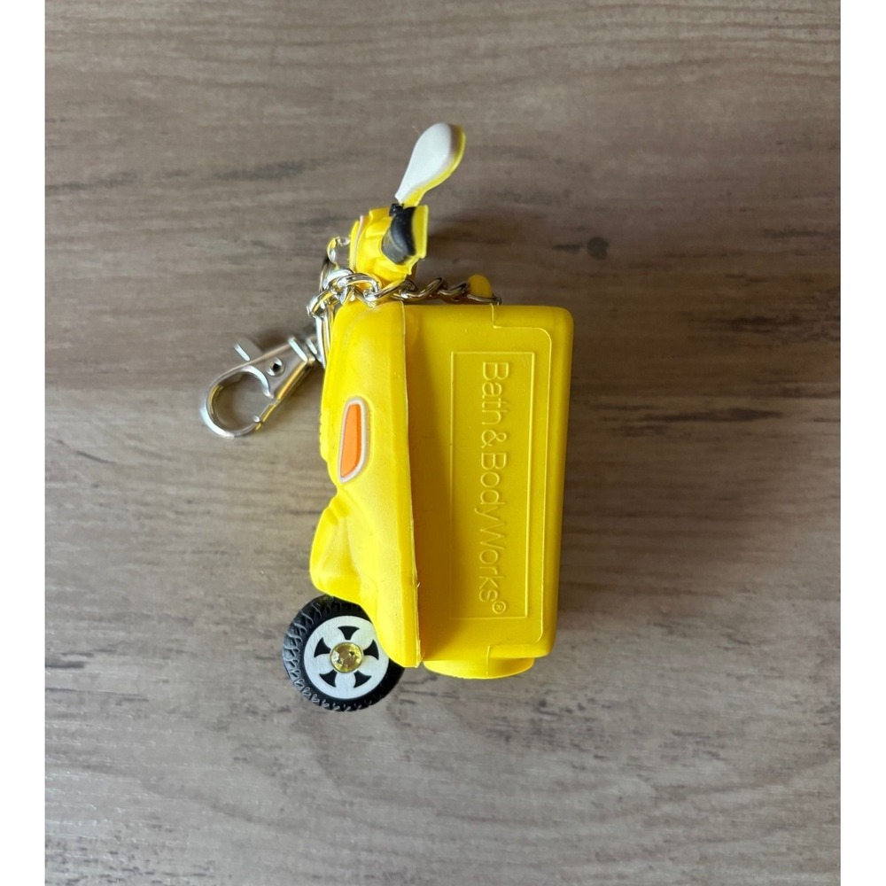 Bath & Body Works PocketBac RETIRED Yellow Scooter Moped Hand Sanitizer Holder - Picture 3 of 6